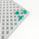 2mL Star Gummy Mold with 219 cavities and three translucent emerald green star gummies