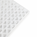 Close-up of an empty 2mL diamond gummy mold with 179 cavities on a white background