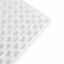 Close-up of an empty 2mL diamond gummy mold with 179 cavities on a white background