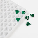 2mL diamond gummy mold with 179 cavities and translucent emerald green gummies on a white background