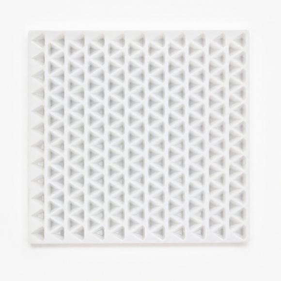 Full horizontal top view of an empty 2mL diamond gummy mold with 179 cavities on a white background