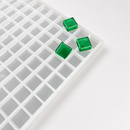 3.5mL square gummy mold shown with finished green square gummies