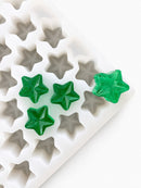 Moule à gummies etoile de 4 mL - 168 cavites - vue du produit, sur fond blanc, avec des gummies vert émeraude
